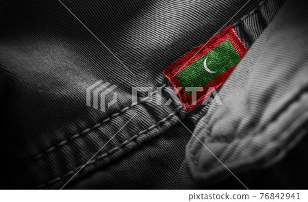 Tag on dark clothing in the form of the flag of the Maldives Tag on dark clothing in the form of the flag of the Maldives 76842941
