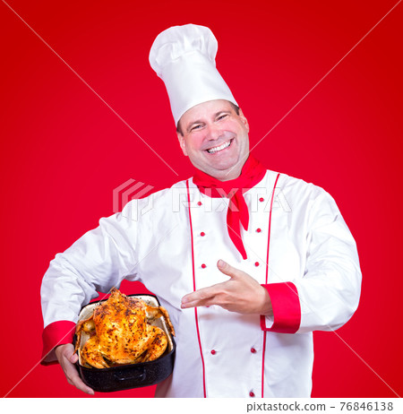 cook shows in a roasting pan with roast poultry cook shows in a roasting pan with roast poultry 76846138