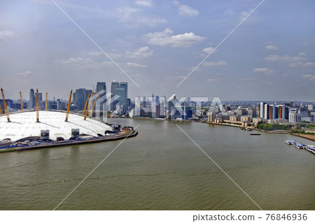 UK, England, London, 02 Arena and Canary Wharf Skyline 76846936