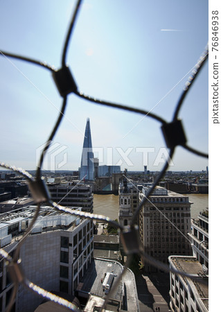View of the Shard, London behind wire net View of the Shard, London behind wire net 76846938