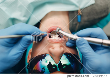 Dentistry Dental clinic. Doctor and patient. Teeth health. Dentistry Dental clinic. Doctor and patient. Teeth health. 76849533