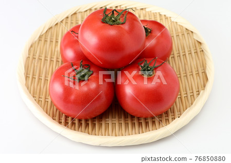 Momotaro tomato on bamboo colander white background white background Momotaro tomato on bamboo colander white background white background 76850880