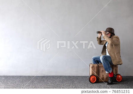 Senior businessman against concrete wall with copy space Senior businessman against concrete wall with copy space 76851231