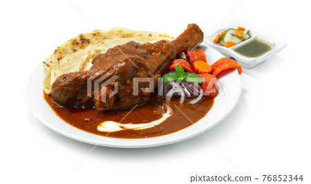 Braised Lamb Shank Masala Curry served Roti 76852344