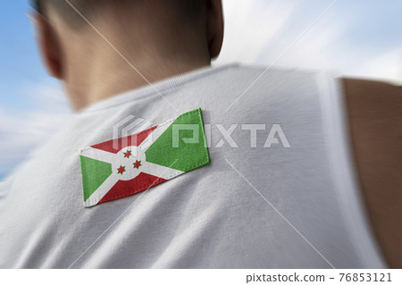 The national flag of Burundi on the athlete's back 76853121