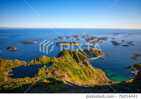 Village of Henningsvaer seen from mount Festvagtinden on Lofoten islands, Norway Village of Henningsvaer seen from mount Festvagtinden on Lofoten islands, Norway 76854441