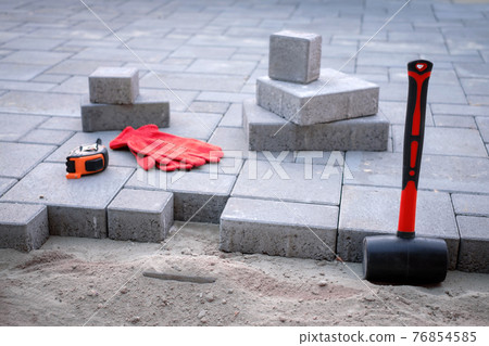 Paving stones paving background closeup 76854585