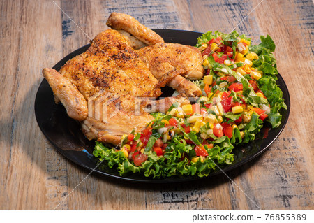 Chicken recipe, roast cockerel and its vegetables, corn condiment 76855389