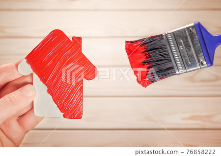 Symbol house painting brush in red colour. New home remodeling renovation paint facade. Painting work house icon renovation home construction model. Make repair house decoration paint home improvement Symbol house painting brush in red colour. New home remodeling renovation paint facade. Painting work house icon renovation home construction model. Make repair house decoration paint home improvement 76858222