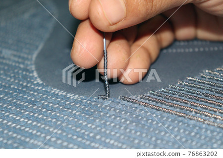 woman shoes design texture on cloth with hand needle for business woman shoes design texture on cloth with hand needle for business 76863202