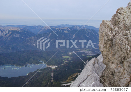 Alpine mountains and Lake Ipe seen from Zugspitze Alpine mountains and Lake Ipe seen from Zugspitze 76865057