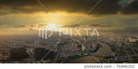 Aerial view of Ho Chi Minh city under dramatic sunset sky Aerial view of Ho Chi Minh city under dramatic sunset sky 76866262