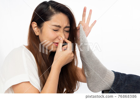 Women who smell men's socks 76868386