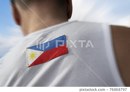 The national flag of Philippines on the athlete's back The national flag of Philippines on the athlete's back 76868797