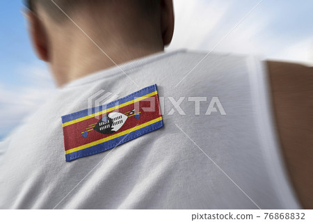 The national flag of Swaziland on the athlete's back The national flag of Swaziland on the athlete's back 76868832