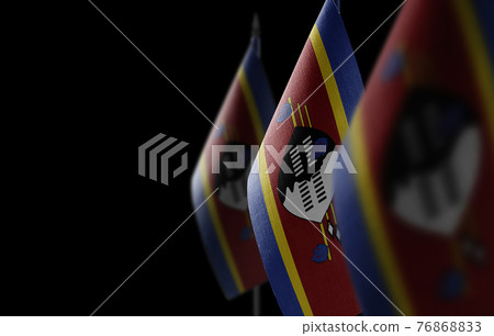 Small national flags of the Swaziland on a black background Small national flags of the Swaziland on a black background 76868833