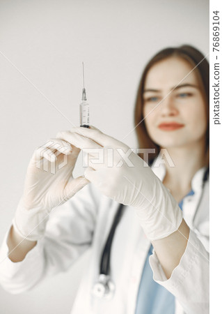 Doctor with vaccination against covid19 Doctor with vaccination against covid19 76869104