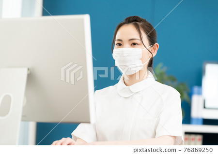 Nurse woman in mask Nurse woman in mask 76869250