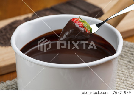 Strawberry chocolate fondue Strawberry chocolate fondue 76871989