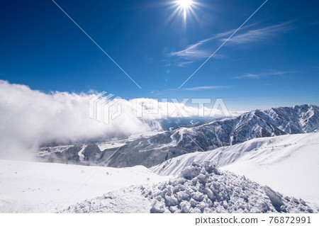 Sunny snow mountain Hakuba Happoone ski resort Sunny snow mountain Hakuba Happoone ski resort 76872991