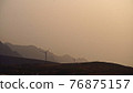 Windmills on Gran Canaria. Landscape looks like Mars hill. 76875157