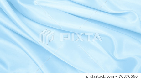 Smooth elegant blue silk or satin luxury cloth texture as abstract background. Luxurious background design Smooth elegant blue silk or satin luxury cloth texture as abstract background. Luxurious background design 76876660