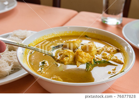 Famous Thai cuisine, Betel leaves and Crab in Coconut Curry Famous Thai cuisine, Betel leaves and Crab in Coconut Curry 76877828