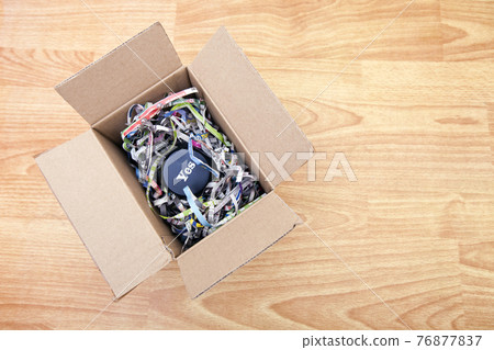 Wooden block with the word Yes wrapped in a box Wooden block with the word Yes wrapped in a box 76877837