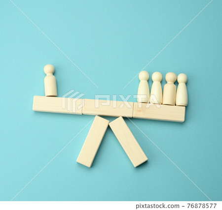 wooden figures of men on a swing, the group outweighs the loner. The concept of conflict of interest, hating wooden figures of men on a swing, the group outweighs the loner. The concept of conflict of interest, hating 76878577