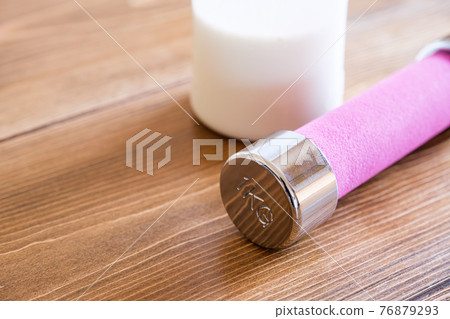 Protein drinks and dumbbells 76879293