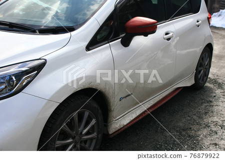 Muddy car body after a snowy or rainy day Muddy car body after a snowy or rainy day 76879922