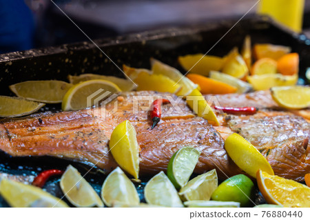 grilled marinated salmon with lemon and lime grilled marinated salmon with lemon and lime 76880440
