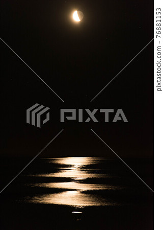 Rishiri Island: Half moon illuminating the Sea of Japan 76881153