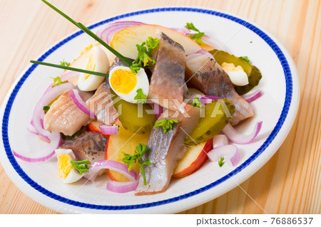 Herring with apples, pickles, onion 76886537