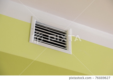Ventilation shaft with air grates on the ceiling. Ventilation shaft with air grates on the ceiling. 76889627