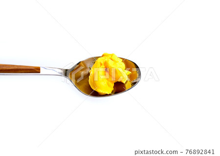 Margarine cheese butter in spoon on white Margarine cheese butter in spoon on white 76892841