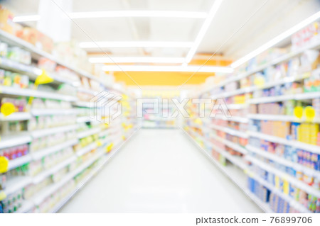 Blurred food and drink on shelf in super market with cart Blurred food and drink on shelf in super market with cart 76899706