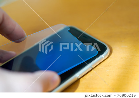 Put a protective glass on your smartphone Put a protective glass on your smartphone 76900219