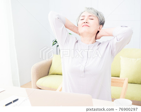 Overworked senior middle aged lady massaging neck feeling hurt pain. Overworked senior middle aged lady massaging neck feeling hurt pain. 76900297
