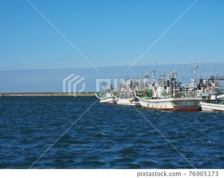 Fishing boat moored at Otaru Port Fishing boat moored at Otaru Port 76905173
