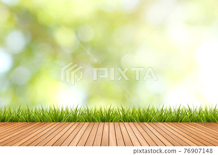 grass with green blurred background and wood floor 76907148