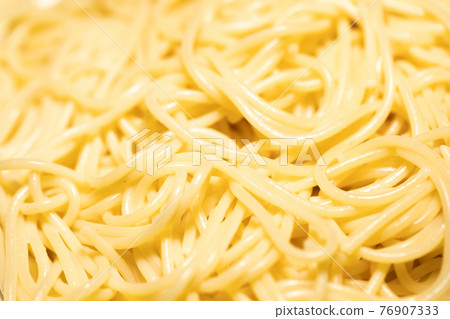 Spaghetti closeup photo as background texture Spaghetti closeup photo as background texture 76907333