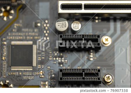 Closeup of computer board with conductors Closeup of computer board with conductors 76907338