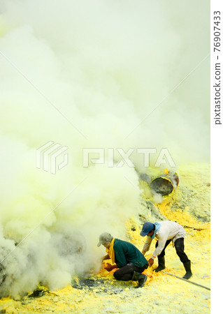 Sulfur miners in Kawah Ijen, Java, Indonesia Sulfur miners in Kawah Ijen, Java, Indonesia 76907433