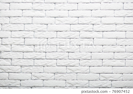 White brick wall texture for your background. Rural room. Abstract shot. Vintage structure. Whiten facade. Copy space for your advertsiement 76907452