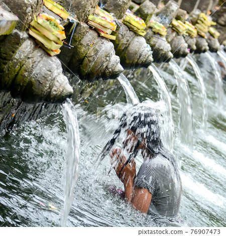 Holy spring water at Tirta Empul Temple Holy spring water at Tirta Empul Temple 76907473