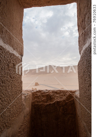 Desert view via a fortress window in Palmyra, Syria 76910633