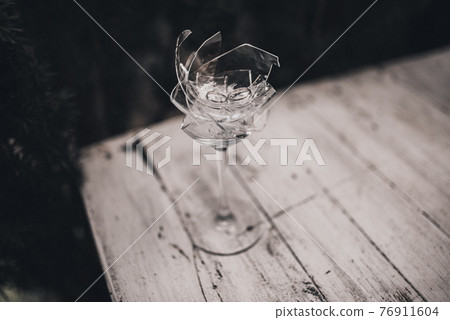 wedding rings in a broken crystal glass wedding rings in a broken crystal glass 76911604