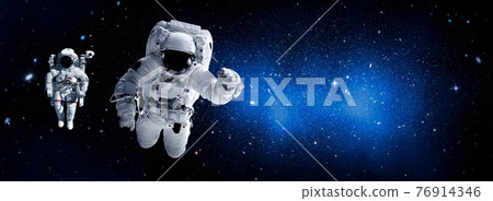 Astronaut spaceman do spacewalk while working for space station 76914346