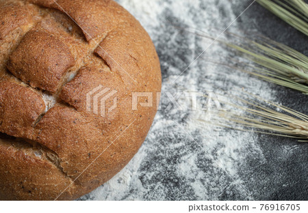 Tasty round rye bread .close up photo Tasty round rye bread .close up photo 76916705